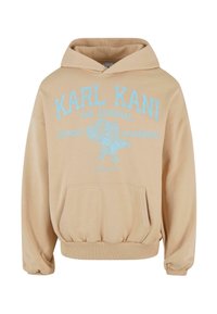 Felpa beige realizzata in misto cotone; presenta una tasca frontale, cappuccio con lacci e una grafica stampata con testo azzurro chiaro e design di un'aquila.