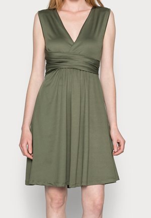 Olive green sleeveless dress, featuring a V-neck, gathered waist, and a flowing skirt. Smooth fabric with no visible patterns or hardware.