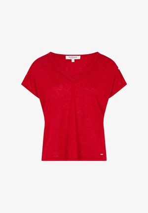 Rotes Kurzarmoberteil mit V-Ausschnitt und lockerer Passform. Hergestellt aus leichtem, strukturiertem Stoff. Kleines Logo-Detail auf dem linken Ärmel.