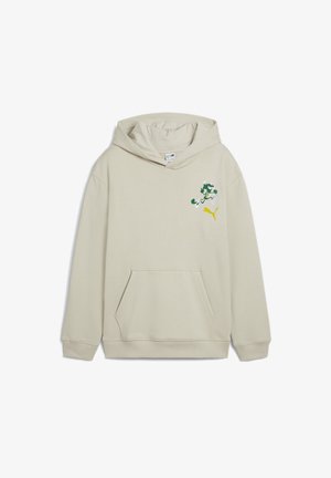 Sweat à capuche beige avec une poche avant, présentant un design de personnage de dessin animé vert et blanc ainsi qu'un logo Puma jaune sur la poitrine.
