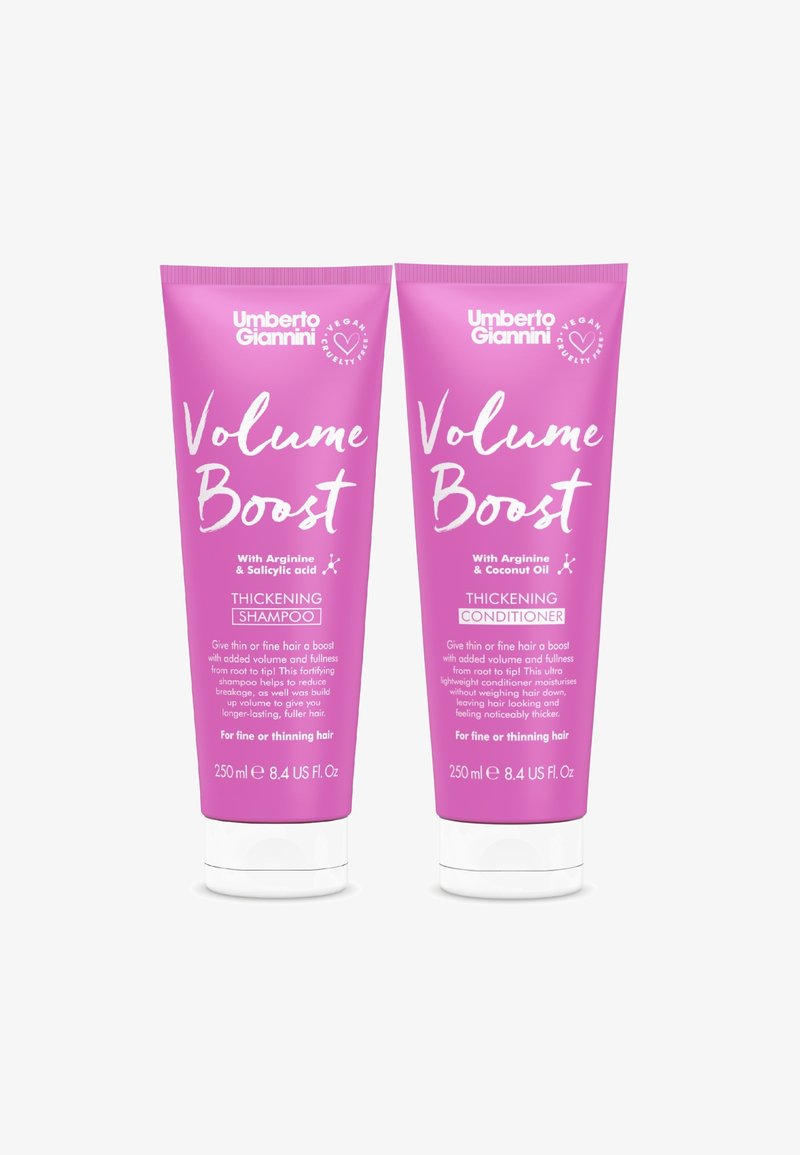 Roze knijptubes van Umberto Giannini Volume Boost verdikkende shampoo en conditioner, gelabeld met productdetails en een inhoud van 250 ml.