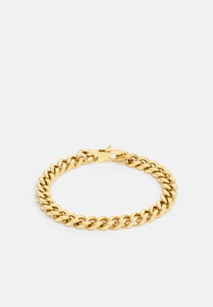 Bracelet chaîne curb ton or avec un fermoir sécurisé en forme de homard, présenté sur un fond blanc.