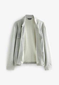 Light gray zip-up jacket with a smooth texture, featuring two front pockets and a stand collar. Interior is off-white with visible stitching.