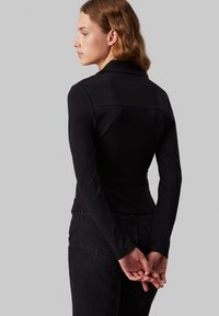 Calvin Klein Jeans ZIPPER LONGSLEEVE MILANO - Jopica - ck black