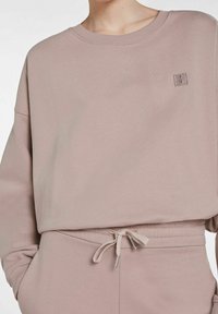 SET Jersey con capucha - light pink
