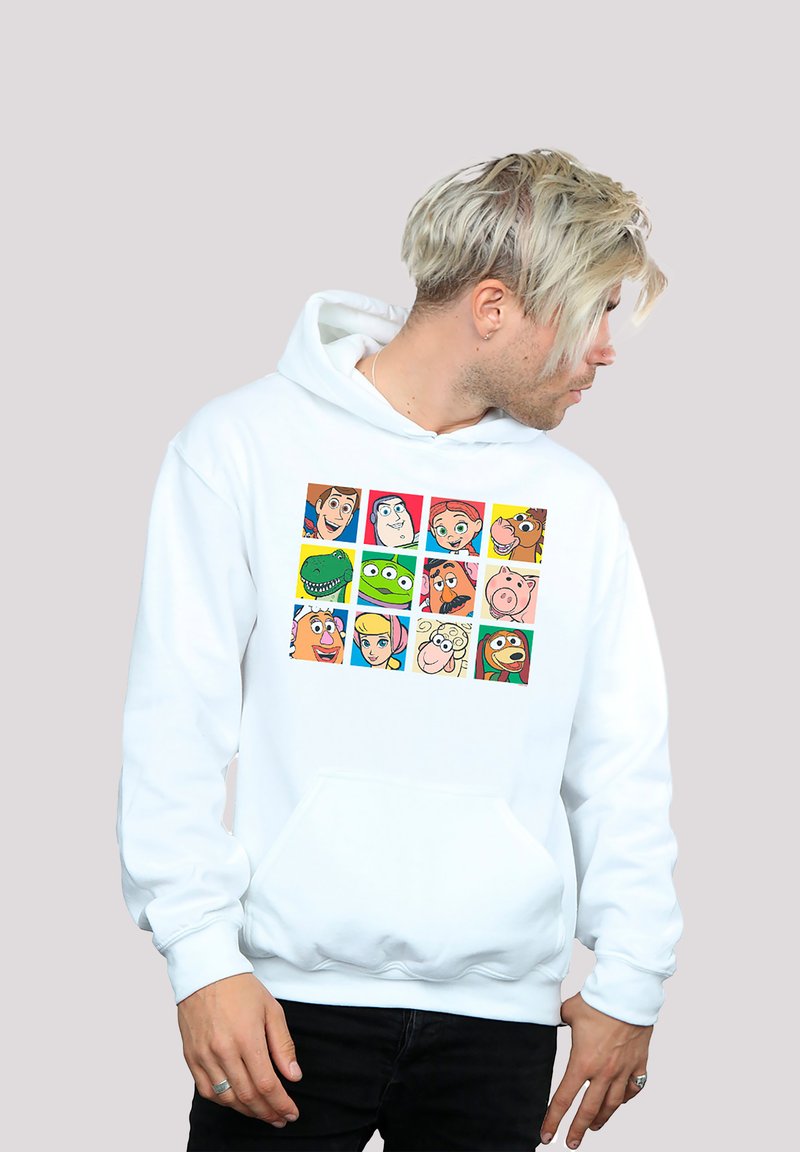 Sudadera blanca con un gráfico frontal que presenta una cuadrícula de caras de personajes de dibujos animados coloridos. Fabricada con tela suave, cuenta con un bolsillo canguro y capucha con cordón.