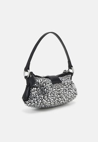 Black handbag with a rounded shape, adorned with silver bead embellishments. Features a short handle and a zip closure. Textured surface.