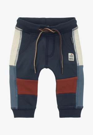 Pantaloni blu navy per bambini con pannelli laterali crema e blu, toppe color ruggine sulle ginocchia, tasche frontali e vita con coulisse multicolore.