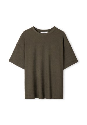 Olijfgroene geribde t-shirt met een ronde hals, korte mouwen en een losse pasvorm. Gestructureerde stof met een rechte zoom.