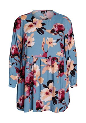 Florale Bluse mit langen Ärmeln, einem runden Ausschnitt und einer lockeren Passform. Sie hat einen blauen Hintergrund mit großen pinken, gelben und kastanienbraunen Blumen.