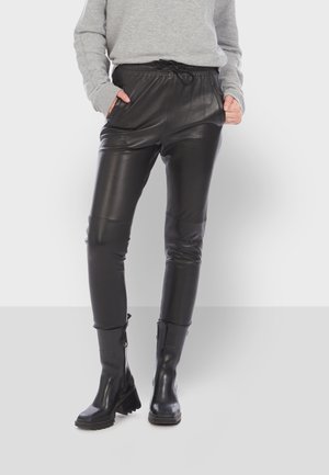 GIFT - Pantalon en cuir - black