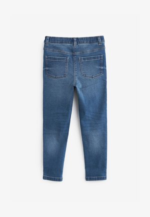 Kék farmer leggings elasztikus derékkal, két hátsó zsebbel és karcsú fazonnal. Az anyag sima textúrájú, enyhe kopással.