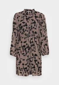 Button-up dress in a light taupe color featuring a black abstract pattern, long puff sleeves, high neckline, and elastic waistband.