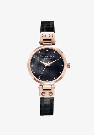 Montre Victoria Hyde avec boîtier en or rose, cadran irisé noir, index et aiguilles en or rose, et bracelet en maille noire.