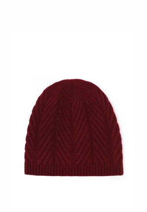 Bonnet en maille rouge foncé avec un motif zigzag texturé et un bord côtelé, présenté sur un fond blanc.
