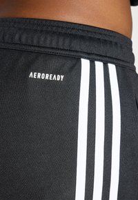 adidas Performance SQUADRA25 TRAINING PANT - Trainingsbroek - black/purple rush