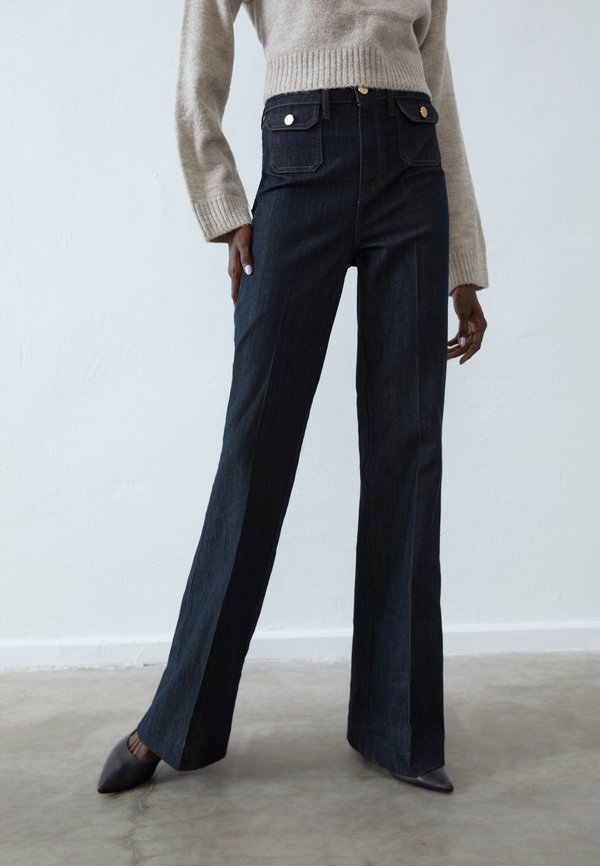 Flared Jeans - raw denim