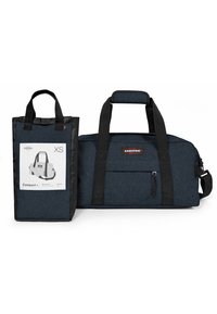 Mørkeblå duffeltaske med sorte accenter, lavet af stofmateriale, med dobbelte bærehåndtag og lynlås. Inkluderer en mindre tote-style taske for nemhed.