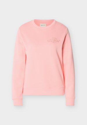 Light pink crewneck sweatshirt with long sleeves and a tonal embroidered logo on the upper left chest.