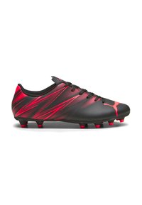 Scarpe da calcio nere con accenti rossi e un motivo a strisce dinamiche. Presentano un design leggero, un upper testurizzato e tacchetti modellati.