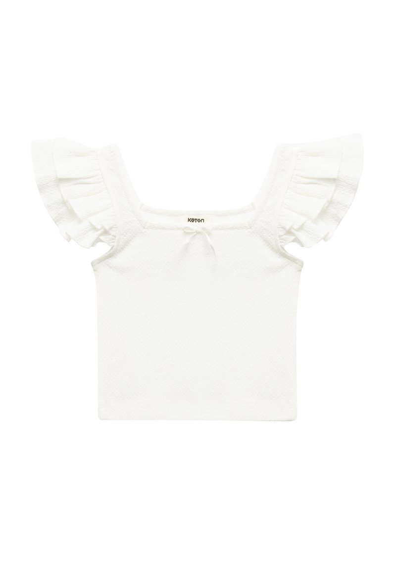 Top bianco a maniche corte con tessuto texturizzato, scollatura quadrata e maniche a balze. Design semplice con un dettaglio centrale a lacci.