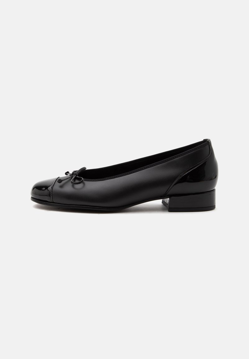 Chaussure femme noire à talon bas, bout arrondi, petit nœud sur le dessus et finition lisse.