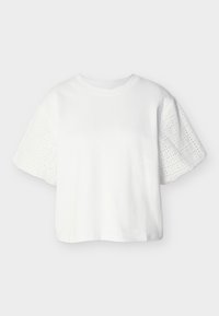 Λευκό κοντομάνικο τοπ με στρογγυλή λαιμόκοψη και φουσκωτά μανίκια με γεωμετρικό μοτίβο με λέιζερ.