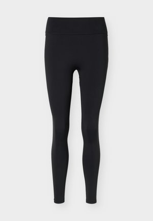Leggings noirs taille haute longueur intégrale en tissu lisse et extensible sans logos ni motifs visibles.
