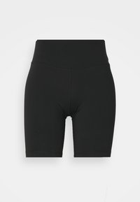 Shorts de cycliste noirs, taille haute et ajustés, longueur mi-cuisse avec des coutures visibles sur un fond clair uni.