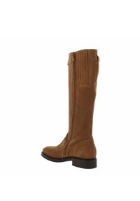 Braune Wildleder-Stiefel bis zum Knie mit glatter Textur, seitlichem Reißverschluss und subtilen vertikalen Nähdetails am Schaft. Schwarzer, robuster Absatz.