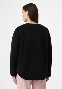 Fila CASSIANO RELAXED TEDDY - Forro polar - black