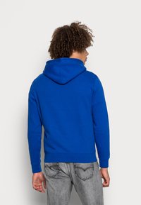 Levi's® CORE HOODIE - Camisola - surf blue