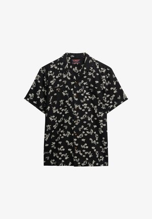 Zwarte katoenen overhemd met korte mouwen, wit bloemenpatroon, twee borstzakken en bruine knopen. Gemaakt van lichte stof met een ontspannen pasvorm.