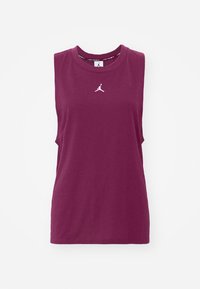 Bordeaux mouwloos tanktop van katoen. Heeft een ronde halslijn en een witte Jordan-logo op de borst. Eenvoudige en gladde textuur.