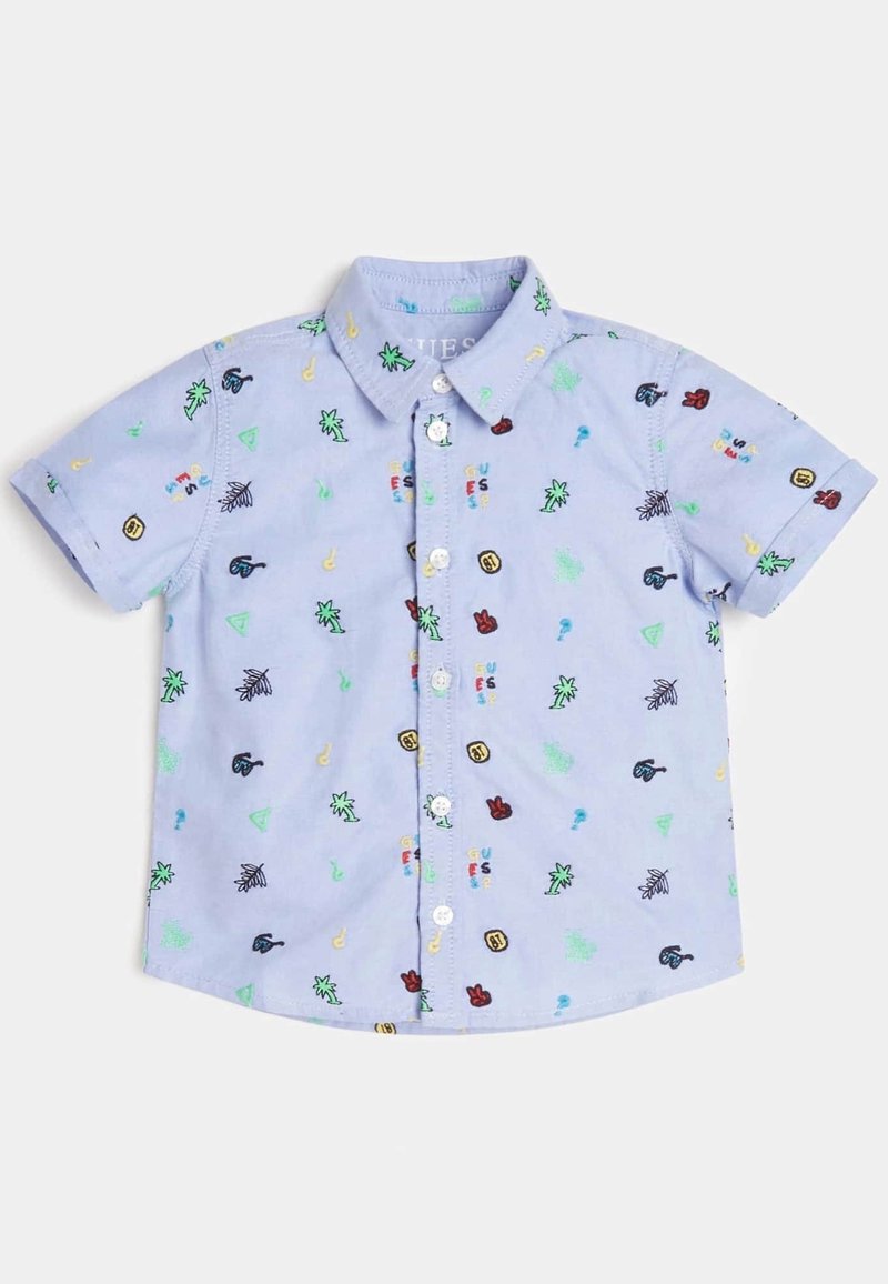 Koszula z krótkim rękawem na guziki w jasnoniebieskim kolorze z wielokolorowymi haftowanymi wzorami, w tym liśćmi, nutami muzycznymi oraz różnymi ikonami.
