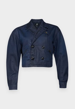 Jachetă cropped dublu-zippată de culoare bleumarin, confecționată din denim, având două buzunare frontale, butoane negre și guler cu colțuri.