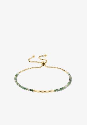 Bracelet en or ajustable avec des perles rondes vertes et blanches et de petites perles hexagonales dorées sur un fond blanc.