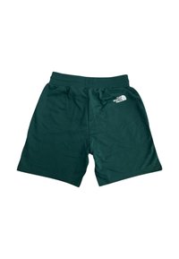 Pantaloni sportivi verdi in cotone con vita elasticizzata e tasche laterali. Presentano un logo bianco sulla coscia sinistra.