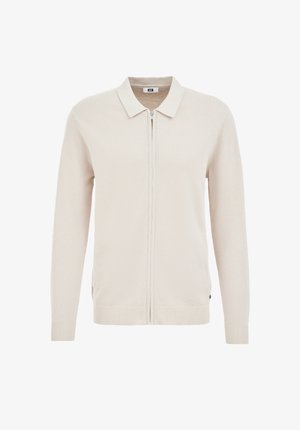 Béžový pletený kardigán s plochým pleteným golierom, úplným zipsom a rebrovanými manžetami. Textúrovaná tkanina s jemnými stehovými detailmi na tele.