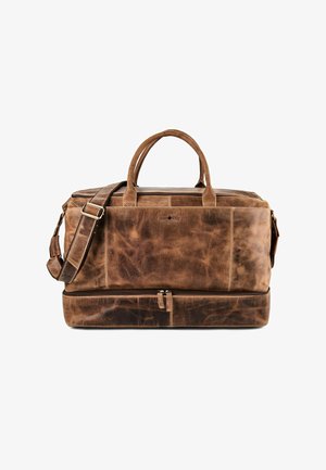 Borsa duffel in pelle marrone consumata con doppi manici, tracolla regolabile e scomparto inferiore con zip per ulteriore spazio.