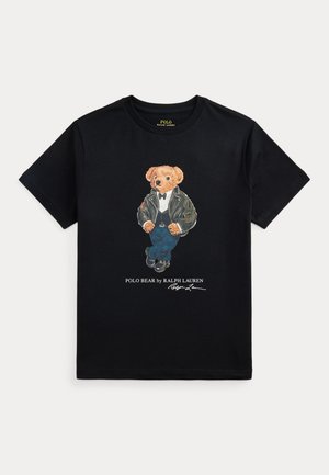 T-shirt noir manches courtes avec un ours portant un smoking et une veste en cuir imprimée sur le devant, avec le texte "Polo Bear by Ralph Lauren" en dessous.