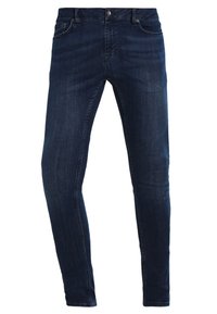 Mörkblå smala jeans i denim med en klassisk femfickdesign och en knäppning i fram. Slät textur och åtsittande passform.