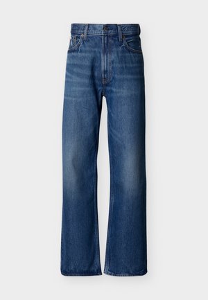 Blå denimjeans med høyt liv, vide ben, femlommet design og en subtil falmingseffekt. Calvin Klein-logo på midjebåndet.