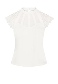 Blouse blanche avec des manches courtes en dentelle, dotée d'un col haut et d'un zip dans le dos. L'avant présente un design à panneaux avec des détails texturés.