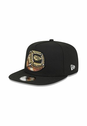 Black fitted cap with embroidered Super Bowl Champions patch featuring Kansas City Chiefs logo on front left panel.