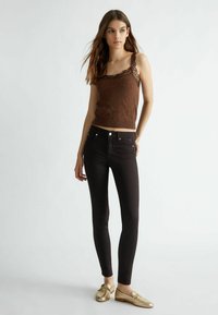 LIU JO BOTTOM UP  - Pantaloni - black