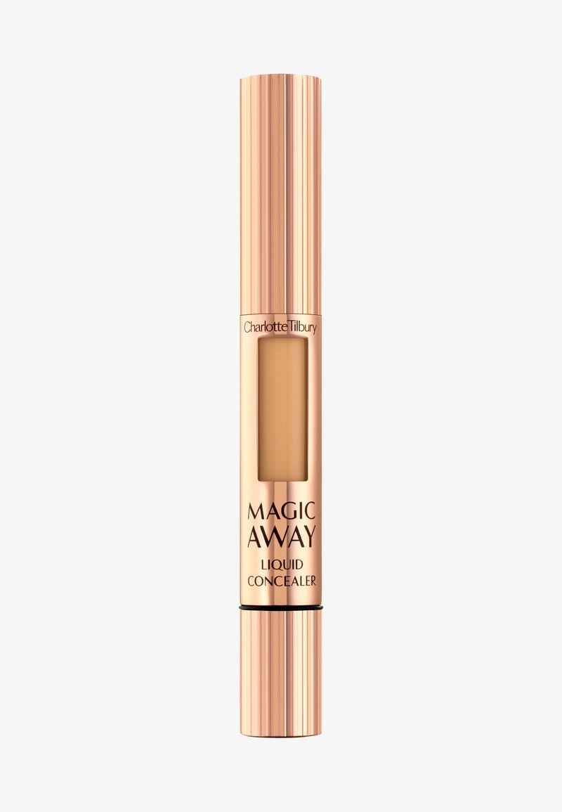 Liquid concealer in a cylindrical, ribbed rose gold tube with a clear window showcasing the shade. Features black accents and brand labeling.