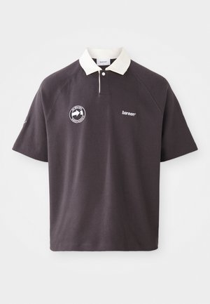 Dark gray polo shirt with a white collar, embroidered logo on the chest, and short raglan sleeves. Made from soft material.