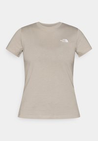 Μπεζ κοντομάνικο t-shirt από βαμβάκι. Διαθέτει στρογγυλή λαιμόκοψη και λευκό λογότυπο στο αριστερό στήθος. Ομαλή υφή με κανονική εφαρμογή.