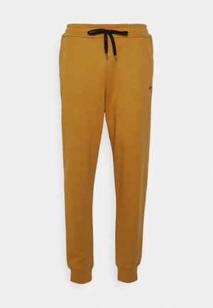 Pantalones deportivos - gold-coloured